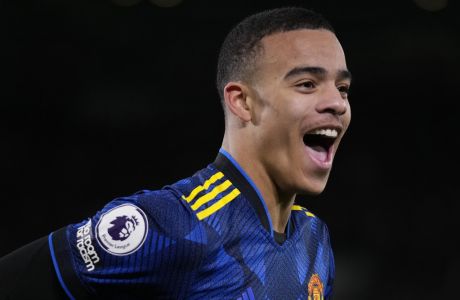 FILE - Manchester United's Mason Greenwood celebrates after scoring his side's second goal during an English Premier League soccer match between Brentford and Manchester United at the Brentford Community Stadium in London, Wednesday, Jan. 19, 2022. Getafe acquired the former Manchester United forward on loan on Friday, Sept. 1, 2023, after the English player left his old club following a criminal investigation into a possible attempted rape that was finally closed by prosecutors. (AP Photo/Matt Dunham, File)