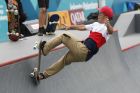 Japan's Kensuke Sasaoka competes in the men's skateboard park final at the 18th Asian Games in Palembang, Indonesia, Wednesday, Aug. 29, 2018. (AP Photo/Vincent Thian)