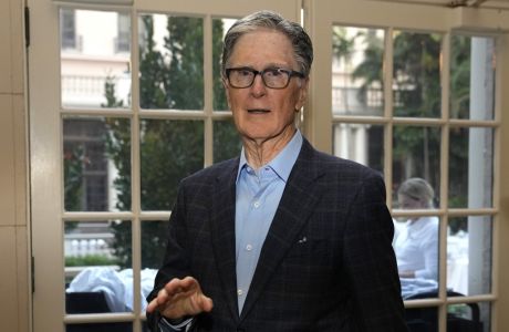 Boston Red Sox owner John Henry speaks with the news media after a meeting of Major League Baseball owners, Thursday, Feb. 9, 2023, in Palm Beach, Fla. (AP Photo/Lynne Sladky)