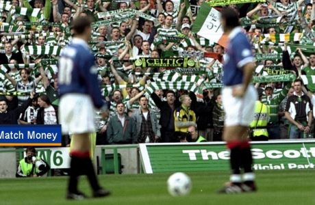 2 May 1999:  Celtic fans cheer during the Scottish Premiership match against Rangers played at Celtic Park In Glasgow, Scotland. Rangers won the game 3-0 to win the title. \ Mandatory Credit: Stu Forster /Allsport