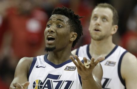 Utah Jazz guard Donovan Mitchell (45) reacts after a Jazz foul during the second half in Game 2 of the team's NBA basketball second-round playoff series against the Houston Rockets, Wednesday, May 2, 2018, in Houston. (AP Photo/Eric Christian Smith)