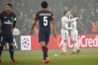 Real Madrid's Cristiano Ronaldo, second right, is hugged by teammate Daniel Carvajal after winning the Champions League round of sixteen second leg soccer match between Paris St. Germain and Real Madrid at the Parc des Princes stadium in Paris, France, Tuesday, March 6, 2018. (AP Photo/Christophe Ena)