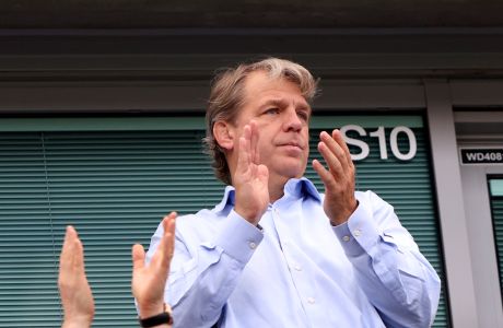 Chelsea owner Todd Boehly applauds from the stands before the English Premier League soccer match between Chelsea and Tottenham Hotspur at Stamford Bridge Stadium in London, Sunday, Aug. 14, 2022. (AP Photo/Ian Walton)