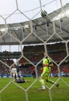 SALVADOR, BRAZIL - JUNE 13: Iker Casillas of Spain watches as a header from Robin van Persie of the Netherlands goes over his head for a goal in the first half during the 2014 FIFA World Cup Brazil Group B match between Spain and Netherlands at Arena Fonte Nova on June 13, 2014 in Salvador, Brazil.  (Photo by Dean Mouhtaropoulos/Getty Images)