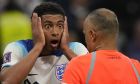 England's Jude Bellingham reacts in front of referee Wilton Sampaio during the World Cup quarterfinal soccer match between England and France, at the Al Bayt Stadium in Al Khor, Qatar, Saturday, Dec. 10, 2022. (AP Photo/Frank Augstein)