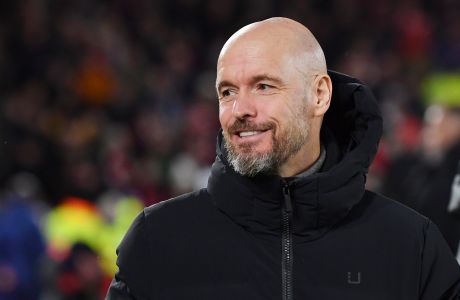 Manchester United's head coach Erik ten Hag smiles before the English Premier League soccer match between Nottingham Forest and Manchester United at City Ground in Nottingham, England, Saturday, Dec. 30, 2023. (AP Photo/Rui Vieira)