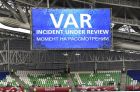 A giant screen reports a VAR incident is being reviewed during the Confederations Cup, Group A soccer match between Portugal and Mexico, at the Kazan Arena, Russia, Sunday, June 18, 2017. (AP Photo/Martin Meissner)