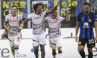Bologna's Joshua Zirkzee celebrates after scoring his side's second goal during a Serie A soccer match between Inter Milan and Bologna at the San Siro stadium in Milan, Italy, Saturday, Oct.7, 2023. (AP Photo/Luca Bruno)