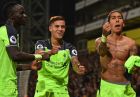Liverpool's Brazilian midfielder Roberto Firmino (R) celebrates with Liverpool's Senegalese midfielder Sadio Mane (L) and Liverpool's Brazilian midfielder Philippe Coutinho after scoring their fourth goal during the English Premier League football match between Crystal Palace and Liverpool at Selhurst Park in south London on October 29, 2016. / AFP / Glyn KIRK / RESTRICTED TO EDITORIAL USE. No use with unauthorized audio, video, data, fixture lists, club/league logos or 'live' services. Online in-match use limited to 75 images, no video emulation. No use in betting, games or single club/league/player publications.  /         (Photo credit should read GLYN KIRK/AFP/Getty Images)