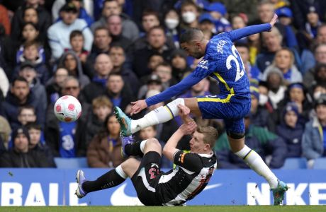 Newcastle's Bruno Guimaraes, left, and Chelsea's Hakim Ziyech vie for the ball during the English Premier League soccer match between Chelsea and Newcastle United at Stamford Bridge stadium in London, Sunday, March 13, 2022. (AP Photo/Kirsty Wigglesworth)