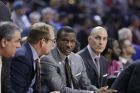 From left, Toronto Raptors assistant coaches Andy Greer, Nick Nurse, head coach Dwane Casey and assistant Rex Kalamian are seen on the bench during the first half of an NBA basketball game against the Detroit Pistons, Sunday, Feb. 28, 2016, in Auburn Hills, Mich. (AP Photo/Carlos Osorio)  