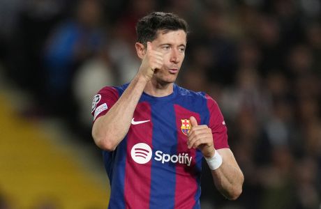 Barcelona's Robert Lewandowski reacts after a missed scoring opportunity during the Champions League quarterfinal second leg soccer match between Barcelona and Paris Saint-Germain at the Olimpic Lluis Companys stadium in Barcelona, Spain, Tuesday, April 16, 2024. (AP Photo/Emilio Morenatti)