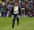 America's coach Miguel Herrera celebrates after defeating Cruz Azul at the final Mexico soccer league championship match at Azteca stadium in Mexico City, Sunday, Dec. 16, 2018. (AP Photo/Eduardo Verdugo)