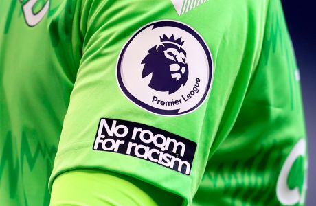 FILE - A "No Room For Racism" logo is visible on the shirt of Everton's goalkeeper Jordan Pickford during the English Premier League soccer match between Tottenham Hotspur and Everton at the Tottenham Hotspur Stadium in London on Sunday, Sept. 13, 2020. (Cath Ivill/Pool via AP, File)