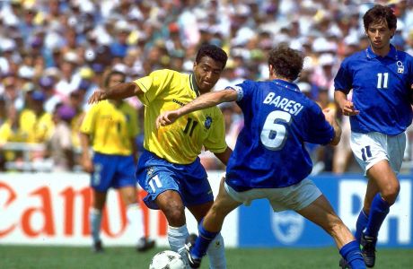 Brazil's Romario (11), center, is challenged by Italian defender Franco Baresi (6) during World Cup Final match July 17, 1994 at the Rose Bowl in Pasadena.  (AP Photo/Carlo Fumagalli)