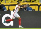 Monaco's Kylian Mbappe celebrates after scoring the opening goal during the Champions League quarterfinal first leg soccer match between Borussia Dortmund and AS Monaco in Dortmund, Germany, Wednesday, April 12, 2017. (AP Photo/Martin Meissner)