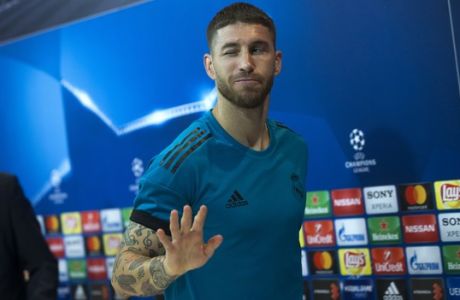 Real Madrid's Sergio Ramos leaves at the end of a news conference at the team's Valdebebas training ground in Madrid, Monday, April 30, 2018. Real Madrid will play a Champions League semi final second leg soccer match with Bayern Munich on Tuesday, May 1. (AP Photo/Francisco Seco)