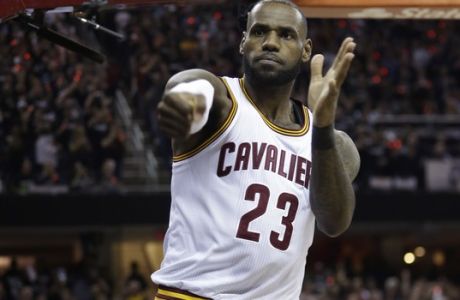Cleveland Cavaliers forward LeBron James (23) reacts against the Golden State Warriors in the first half of Game 4 of basketball's NBA Finals in Cleveland, Friday, June 9, 2017. (AP Photo/Tony Dejak)