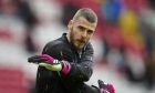 Manchester United's goalkeeper David de Gea warms-up ahead of the English Premier League soccer match between Liverpool and Manchester United at Anfield in Liverpool, England, Sunday, March 5, 2023. (AP Photo/Jon Super)