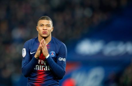PSG's Kylian Mbappe reacts during the French League One soccer match between Paris Saint Germain and Montpellier at the Parc des Princes stadium in Paris, France, Wednesday, Feb. 20, 2019. (AP Photo/Francois Mori)