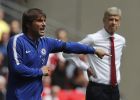 Chelsea's team manager Antonio Conte, left, gestures beside Arsenal manager Arsene Wenger during the English Community Shield soccer match between Arsenal and Chelsea at Wembley Stadium in London, Sunday, Aug. 6, 2017. (AP Photo/Frank Augstein)