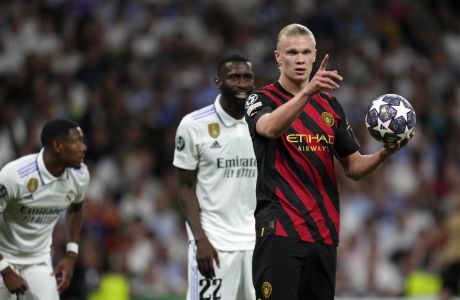 Manchester City's Erling Haaland reacts after missing a chance during the Champions League semifinal first leg soccer match between Real Madrid and Manchester City at the Santiago Bernabeu stadium in Madrid, Spain, Tuesday, May 9, 2023. (AP Photo/Manu Fernandez)