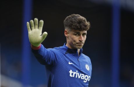 Chelsea's goalkeeper Kepa Arrizabalaga warms up prior to the start of the English Premier League soccer match between Chelsea and Aston Villa at Stamford Bridge stadium in London, Saturday, April 1, 2023. (AP Photo/David Cliff)