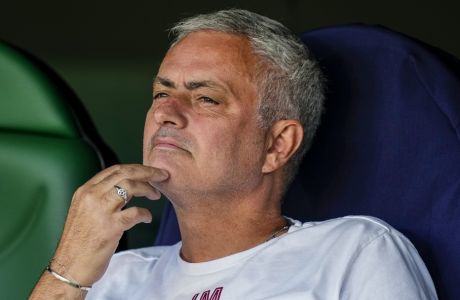 Roma's head coach Jose Mourinho sits on the bench prior the start a Group C Europa League soccer match between Betis and Roma at the Benito Villamarin stadium in Seville, Spain, Thursday, Oct. 13, 2022. (AP Photo/Jose Breton)