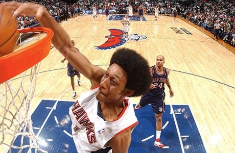 ATLANTA - FEBRUARY 2: Josh Childress #1 of the Atlanta Hawks dunks against the New Jersey Nets at Philips Arena on February 2, 2008 in Atlanta, Georgia. NOTE TO USER: User expressly acknowledges and agrees that, by downloading and/or using this Photograph, user is consenting to the terms and conditions of the Getty Images License Agreement. Mandatory Copyright Notice: Copyright 2008 NBAE. (Photo by Scott Cunningham/NBAE via Getty Images) *** Local Caption *** Josh Childress