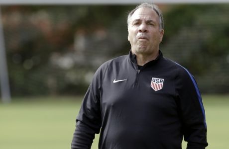 United States head coach Bruce Arena watches players go through drills during a soccer training session, Monday, Oct. 2, 2017, in Sanford, Fla. The United States hosts Panama in a World Cup qualifying match on Friday, Oct. 6. (AP Photo/John Raoux)