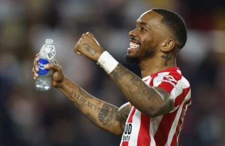 Brentford's Ivan Toney gestures to the crowd following the English Premier League soccer match between Brentford and Fulham at Brentford Community Stadium in Brentford, West London, Monday, March 6, 2023. (AP Photo/David Cliff)