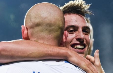 Slovakia's Robert Mak, right, celebrates with teammate Vladimir Weiss after he scored  during a Group C Euro 2016 qualifying soccer match between Luxembourg and Slovakia at the Josy Barthel stadium in Luxembourg on Monday, Oct. 12, 2015. (AP Photo/Geert Vanden Wijngaert)