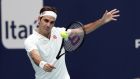 Roger Federer, of Switzerland returns to John Isner, during the singles final of the Miami Open tennis tournament, Sunday, March 31, 2019, in Miami Gardens, Fla. Federer won 6-1, 6-4. (AP Photo/Lynne Sladky)