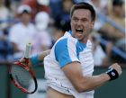 Robin Soderling, of Sweden, reacts after his win against Andy Murray of Britain, during their match at the BNP Paribas Open tennis tournament in Indian Wells, Calif., Friday, March 19, 2010.  (AP Photo/Chris Carlson)