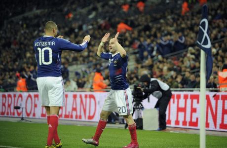 France's Mathieu Valbuena, right, celebrates his goal with his teammate Karim Benzema during the international friendly soccer match between England and France at Wembley stadium in London, Wednesday, Nov. 17, 2010.  (AP Photo/Tom Hevezi)