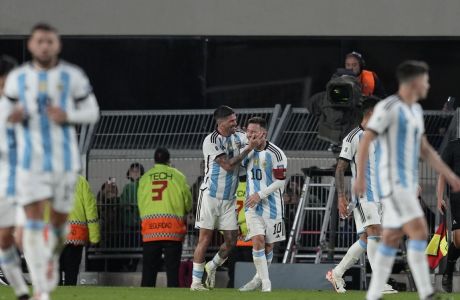 Argentina's Lionel Messi (10) celebrates with Rodrigo De Paul his side's first goal against Ecuador during a qualifying soccer match for the FIFA World Cup 2026, at Monumental stadium in Buenos Aires, Argentina, Thursday, Sept. 7, 2023. (AP Photo/Natacha Pisarenko)