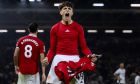 Manchester United's Alejandro Garnacho celebrates scoring his last minute win during the Premier League soccer match between Fulham and Manchester United at Craven Cottage in London, England, Sunday November 13th, 2022. (AP Photo/Leila Coker)