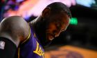 Los Angeles Lakers forward LeBron James reacts after a foul during the second half of an NBA basketball game against the Memphis Grizzlies in Los Angeles, Friday, Jan. 5, 2024. (AP Photo/Ashley Landis)