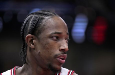 Chicago Bulls' DeMar DeRozan looks across the court during an NBA basketball game against the Los Angeles Lakers Wednesday, March 29, 2023, in Chicago. (AP Photo/Charles Rex Arbogast)