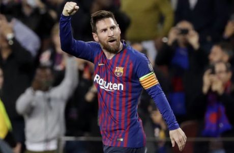 Barcelona's Lionel Messi celebrates after scoring his side's second goal during the Champions League semifinal, first leg, soccer match between FC Barcelona and Liverpool at the Camp Nou stadium in Barcelona, Spain, Wednesday, May 1, 2019. (AP Photo/Emilio Morenatti)