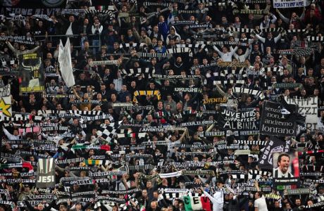 Juventus' supporters hold their team's scarves during the Italian Serie A football match between Juventus and Inter Milan at the Juventus Stadium in Turin on March 25, 2012. Juventus beat Inter Milan 2-0. AFP PHOTO / GIUSEPPE CACACE        (Photo credit should read GIUSEPPE CACACE/AFP/GettyImages)
