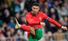 FILE - Portugal's Cristiano Ronaldo attempts a shot at goal during the international friendly soccer match between Slovenia and Portugal at the Stozice stadium in Ljubljana, Slovenia, Tuesday, March 26, 2024. The 24-team lineup is complete and all roads now lead to Germany for the European Championship. (AP Photo/Darko Bandic), File)