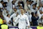 Real Madrid's Cristiano Ronaldo celebrates his side's 2nd goal during a Champions League Round of 16 first leg soccer match between Real Madrid and Paris Saint Germain at the Santiago Bernabeu stadium in Madrid, Spain, Wednesday, Feb. 14, 2018. (AP Photo/Francisco Seco)