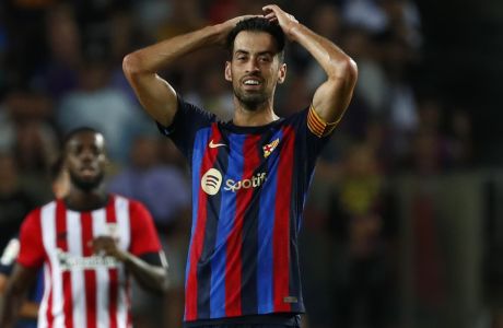 Barcelona's Sergio Busquets gestures during a Spanish La Liga soccer match between Barcelona and Athletic Club at the Camp Nou stadium in Barcelona, Spain, Sunday, Oct. 23, 2022. (AP Photo/Joan Monfort)
