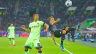 MOENCHENGLADBACH, GERMANY - SEPTEMBER 30: Patrick Herrmann of Borussia Monchengladbach  clears the ball under pressure from Sergio Aguero of Manchester City during the UEFA Champions League Group D match between VfL Borussia Monchengladbach and Manchester City at the Borussia Park Stadium on September 30, 2015 in Moenchengladbach, Germany.  (Photo by Alex Grimm/Bongarts/Getty Images)