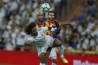 Real Madrid's Marcelo, front, vies for the ball with Valencia's Simone Zaza during a Spanish La Liga soccer match between Real Madrid and Valencia at the Santiago Bernabeu stadium in Madrid, Sunday, Aug. 27, 2017. (AP Photo/Francisco Seco)