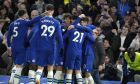 Chelsea players celebrate after Chelsea's Joao Felix, centre, scored his side's opening goal during the English Premier League soccer match between Chelsea and Everton at Stamford Bridge stadium in London, Saturday, March 18, 2023. (AP Photo/Kirsty Wigglesworth)