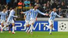 Malaga's Portuguese midfielder Eliseu (R) celebrates with teammates after scoring against RSC Anderlecht during their Champions League football match at the Constant Vanden Stock Stadium on October 3, 2012 in Brussels. AFP PHOTO/JOHN THYS        (Photo credit should read JOHN THYS/AFP/GettyImages)