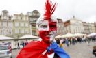 A Croatian soccer fan poses for a picture in downtown Poznan, June 14, 2012. Croatia and Italy will play their Euro 2012 Group C soccer match at the Municipal Stadium in Poznan on Thursday.     REUTERS/Tony Gentile (POLAND  - Tags: SPORT SOCCER HEADSHOT)  