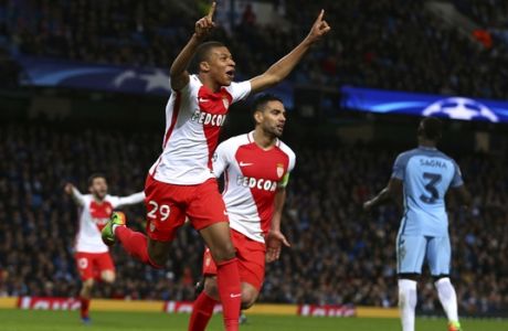Monaco's Kylian Mbappe celebrates after scoring his side's second goal during the Champions League round of 16 first leg soccer match between Manchester City and Monaco at the Etihad Stadium in Manchester, England, Tuesday Feb. 21, 2017. (AP Photo/Dave Thompson)